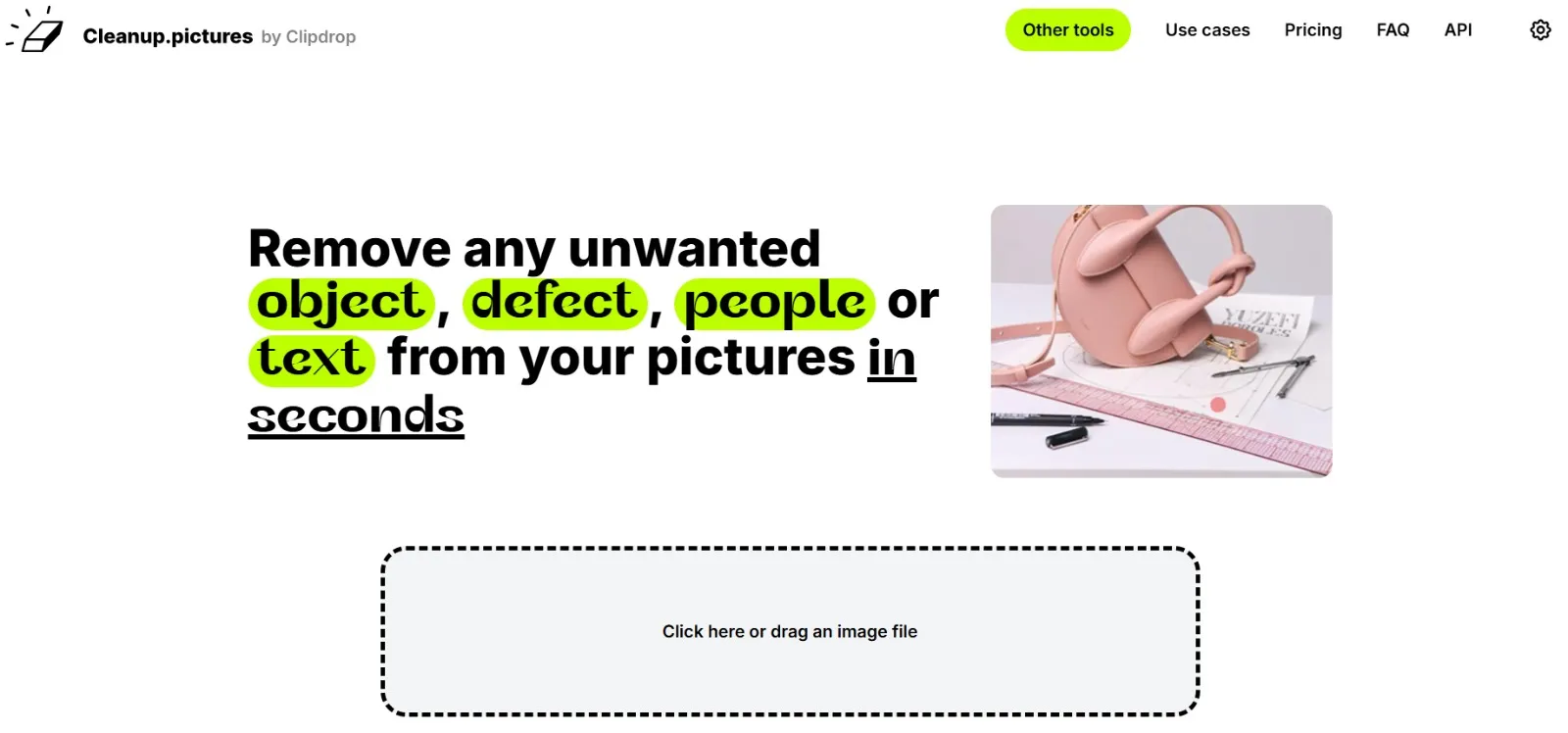 Cleanup.pictures interface by Clipdrop showing object, defect, people and text removal from photos