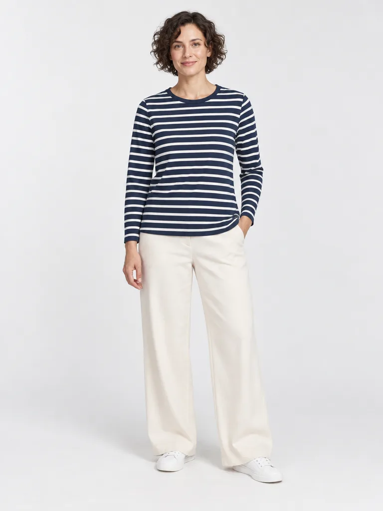 Striped top on a model in a studio