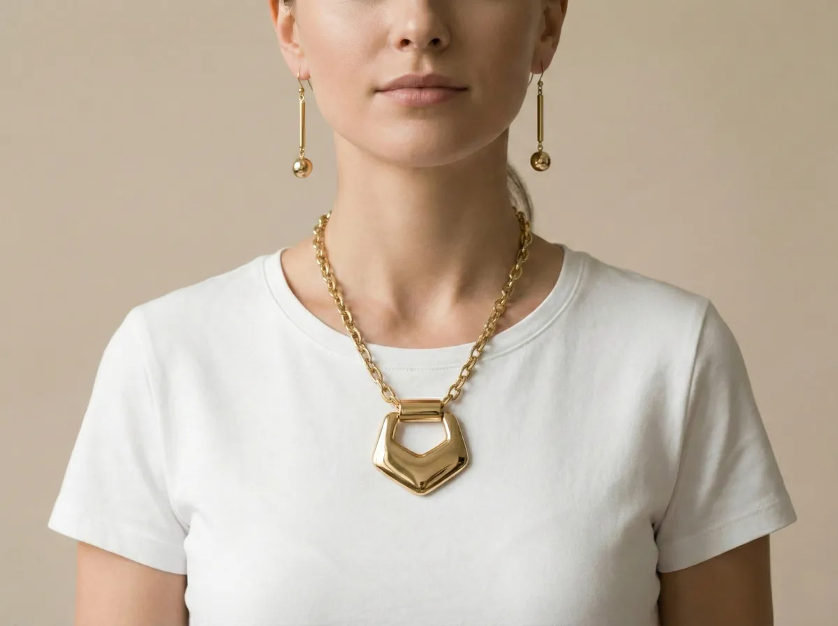 Same model with AI-generated gold necklace and earrings added via generative fill